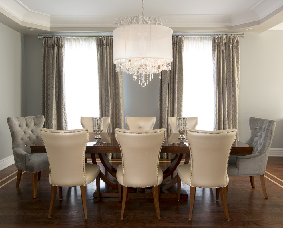 Design ideas for a transitional dining room in New York with grey walls.