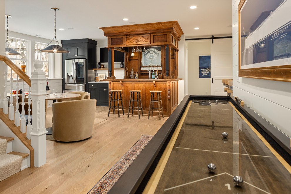Example of a beach style basement design in Minneapolis