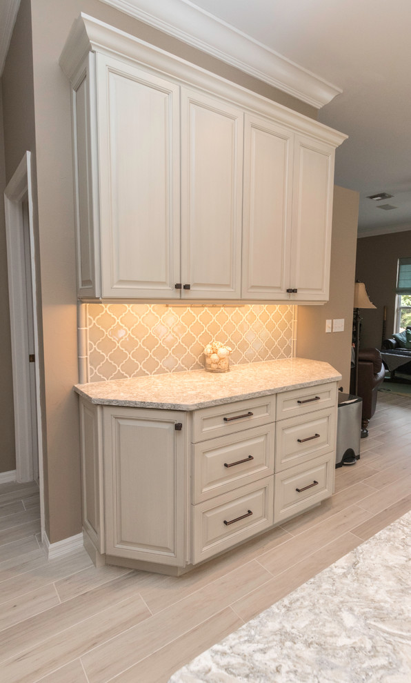 Inspiration for a transitional home design remodel in Miami