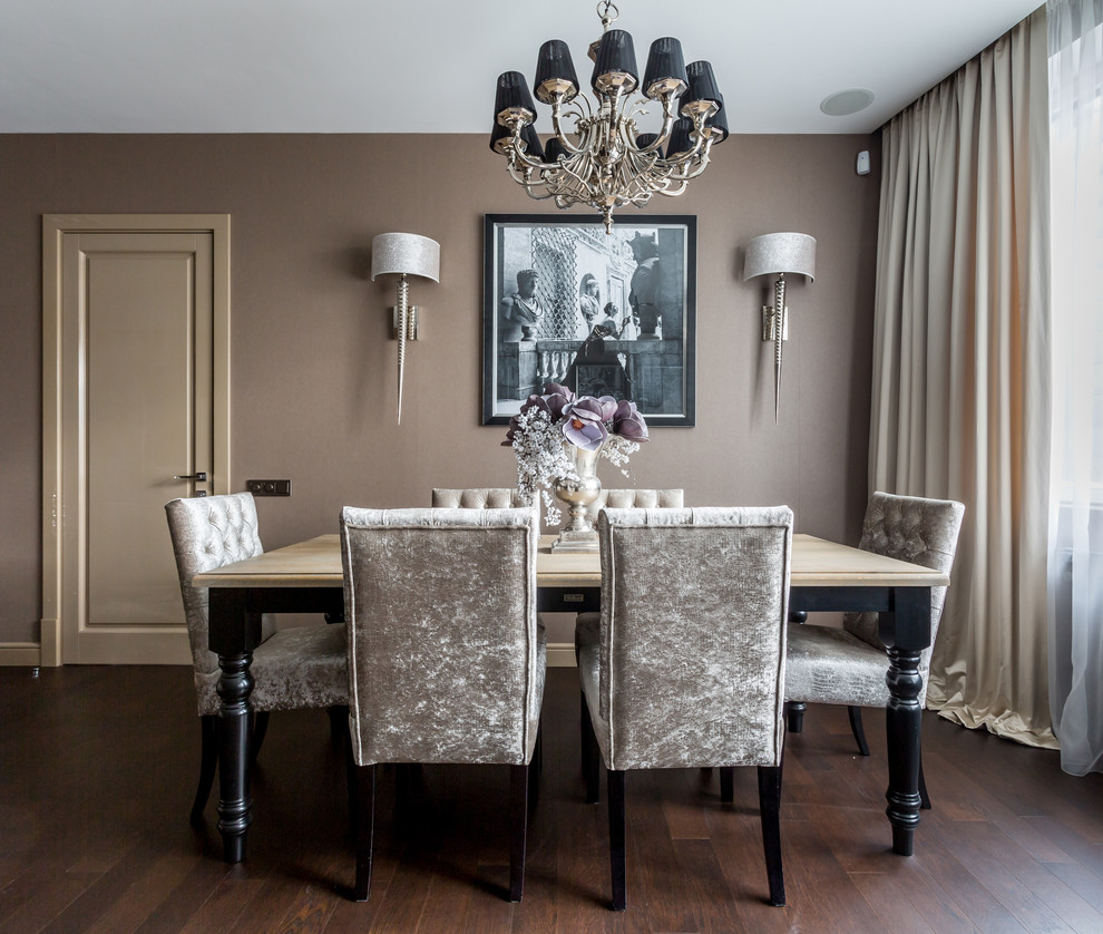 Design ideas for a traditional dining room in Moscow with beige walls and dark hardwood floors.