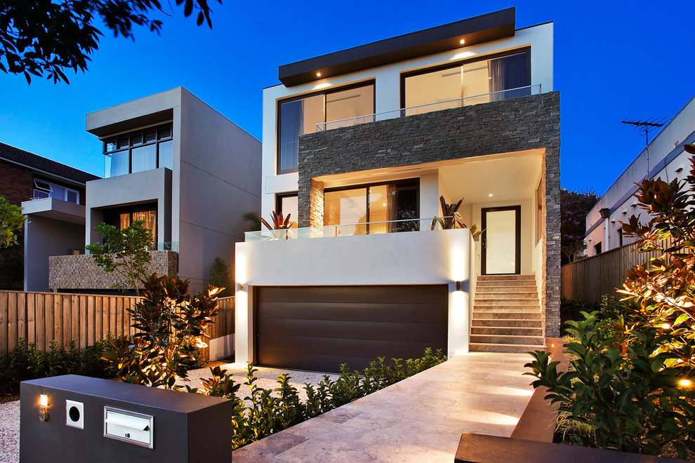 Photo of a large contemporary three-storey brick exterior in Sydney.
