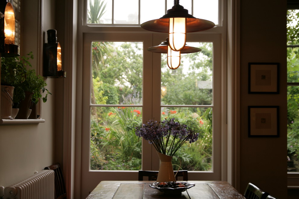 Inspiration for a traditional dining room in Sussex.