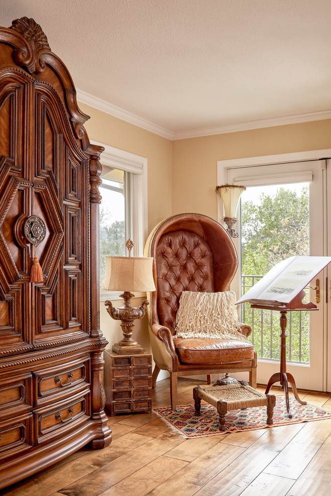 Bedroom - traditional medium tone wood floor and brown floor bedroom idea in San Francisco with beige walls