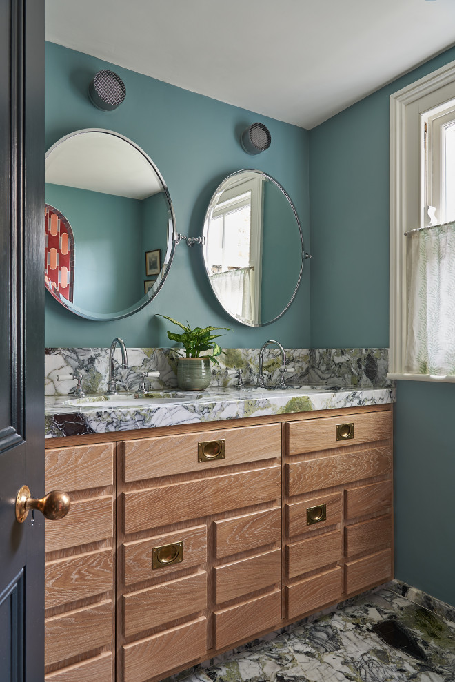 Example of a large transitional 3/4 bathroom design in London with a built-in vanity