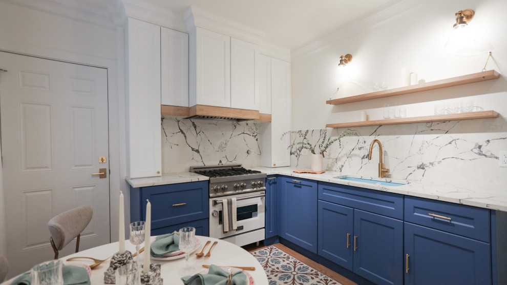 Mid-sized transitional l-shaped ceramic tile and blue floor enclosed kitchen photo in Chicago with an undermount sink, flat-panel cabinets, blue cabinets, quartz countertops, yellow backsplash, stone slab backsplash, colored appliances, no island and white countertops