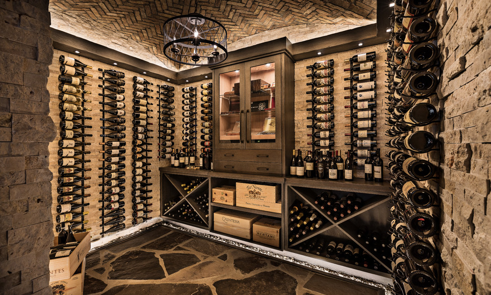 Design ideas for a mid-sized transitional wine cellar in Detroit with slate floors, storage racks and grey floor.