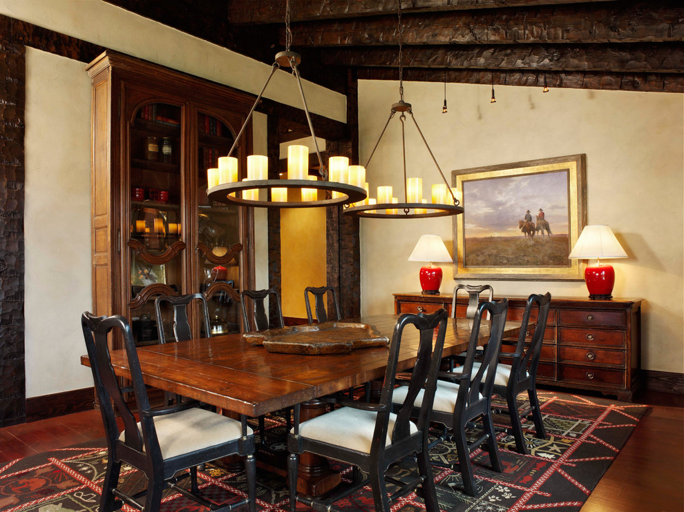 Design ideas for a country dining room in Denver with beige walls and dark hardwood floors.