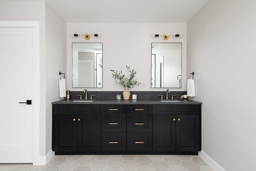 Large transitional master bathroom in Denver with shaker cabinets, black cabinets, white tile, porcelain tile, grey walls, porcelain floors, an undermount sink, engineered quartz benchtops, grey floor, grey benchtops, an enclosed toilet, a double vanity and a built-in vanity.