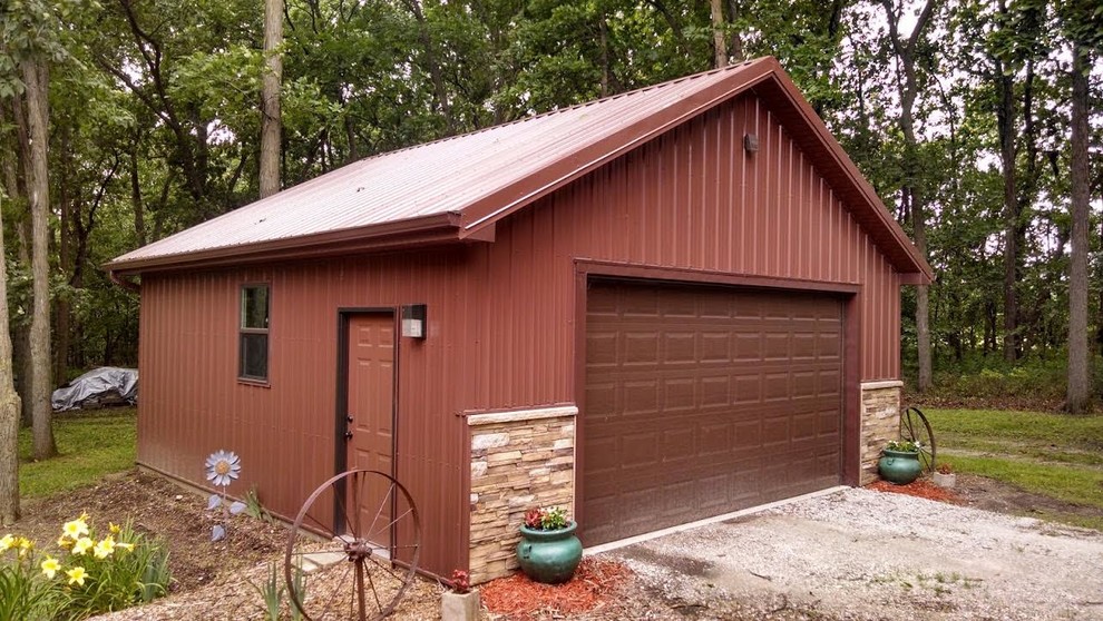 Example of a mid-sized transitional detached two-car garage workshop design