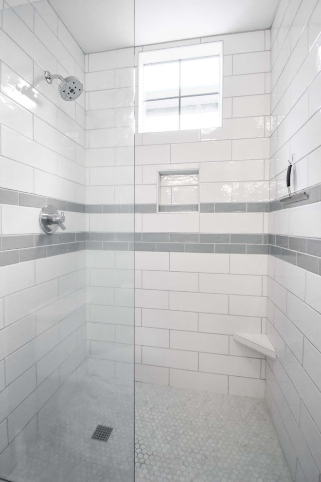 This is an example of a small modern 3/4 bathroom in Portland with flat-panel cabinets, light wood cabinets, an alcove shower, a two-piece toilet, white tile, subway tile, beige walls, cork floors, an undermount sink, engineered quartz benchtops, red floor, a hinged shower door, white benchtops, a niche, a double vanity and a built-in vanity.