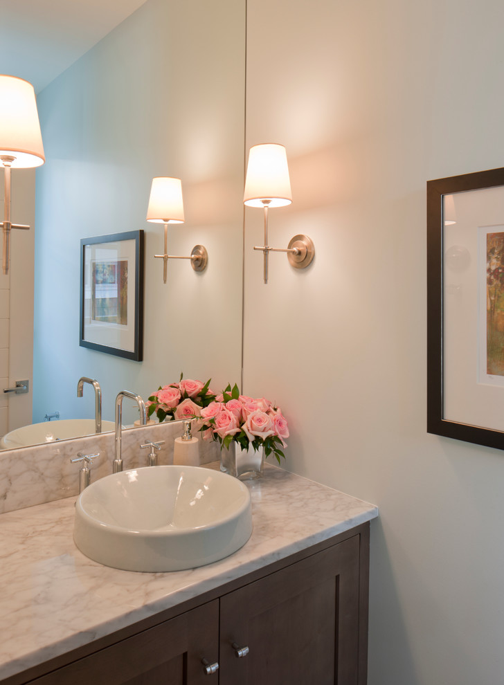 Design ideas for a beach style powder room in Grand Rapids.
