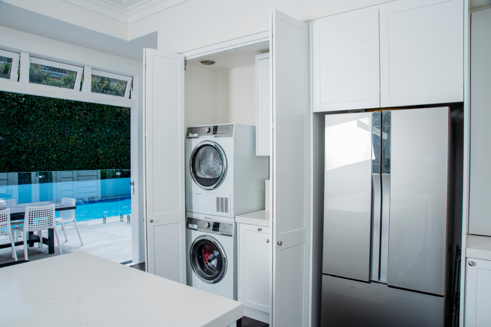 Example of a laundry room design in Other