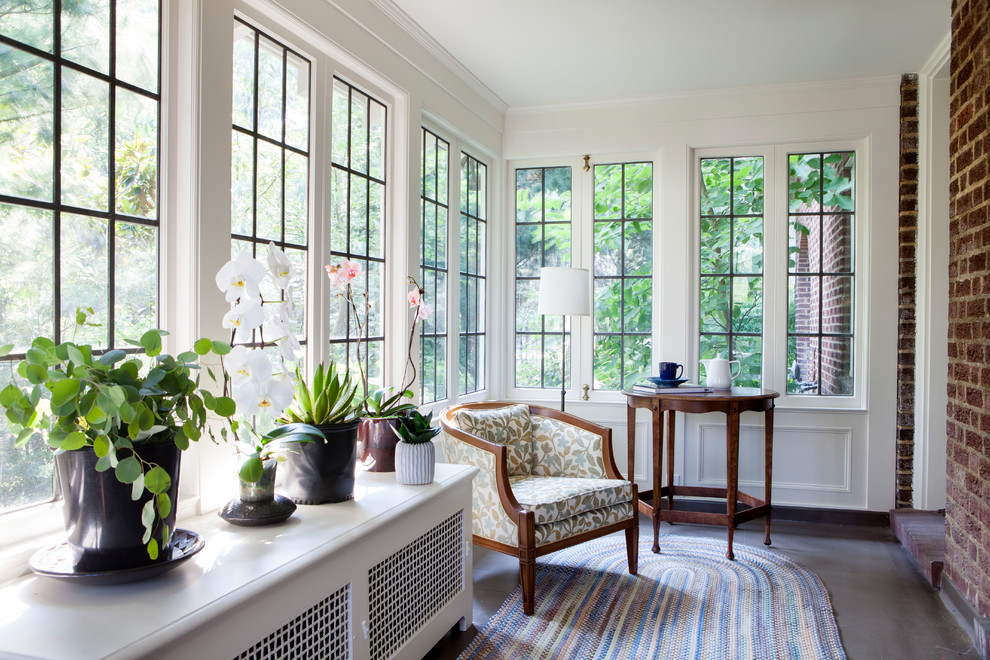 Photo of a mid-sized arts and crafts sunroom in Seattle with concrete floors.