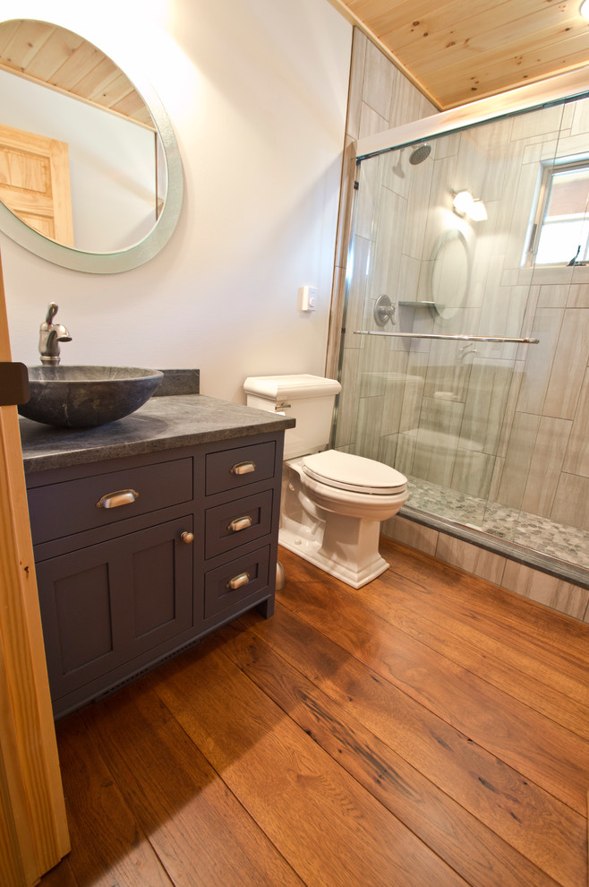 Mid-sized arts and crafts bathroom in Boston with shaker cabinets, blue cabinets and white walls.