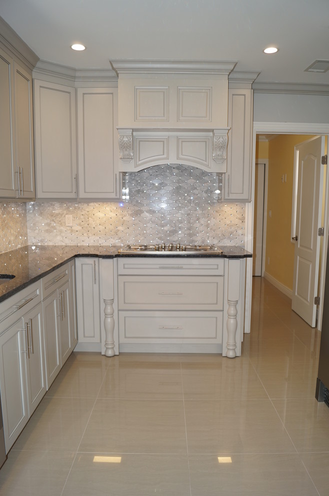 Example of a transitional kitchen design in New York