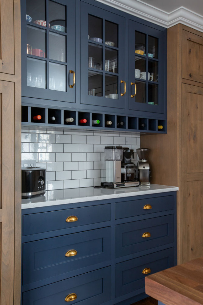 Example of a transitional kitchen design in New York