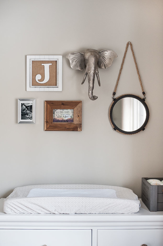 Inspiration for a mid-sized transitional gender-neutral nursery in Toronto with grey walls and dark hardwood floors.