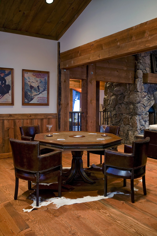 Inspiration for a country family room in Sacramento with a game room, white walls and medium hardwood floors.