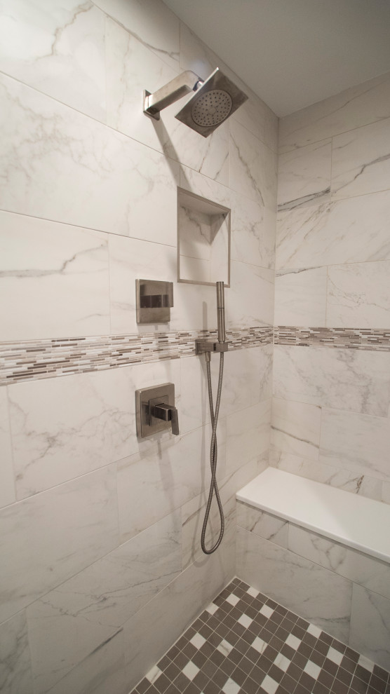 This is an example of a mid-sized modern master bathroom in DC Metro with flat-panel cabinets, grey cabinets, a double shower, a two-piece toilet, porcelain tile, beige walls, porcelain floors, an undermount sink, white floor, a hinged shower door, a double vanity and a built-in vanity.