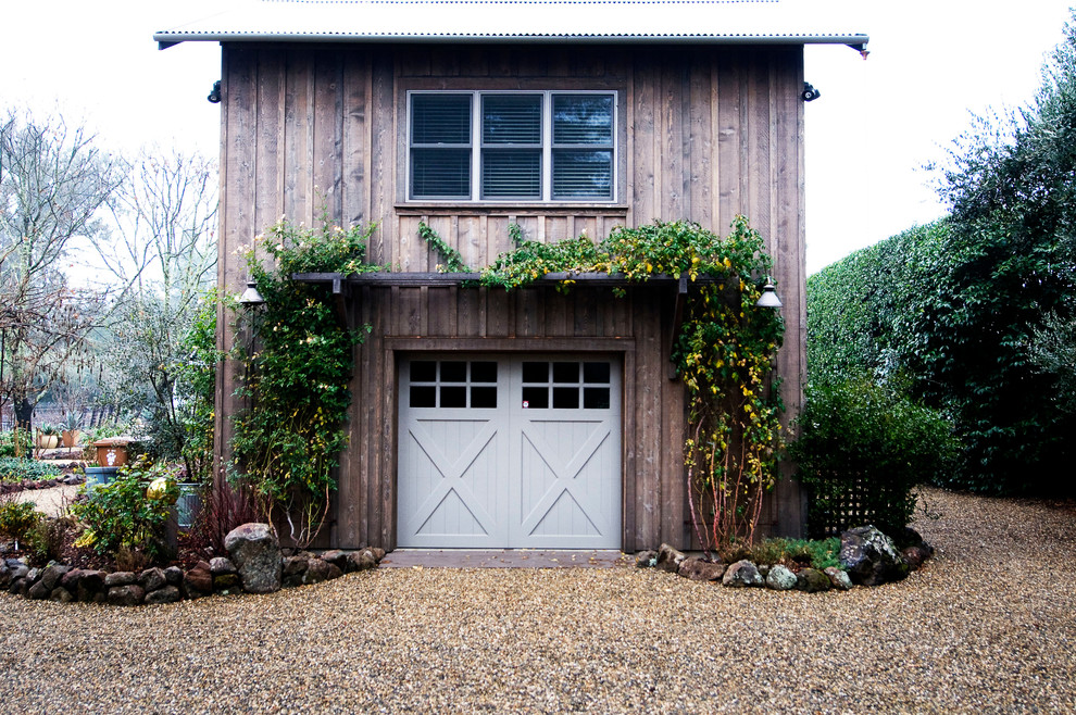 Photo of a mid-sized arts and crafts detached one-car garage in San Francisco.