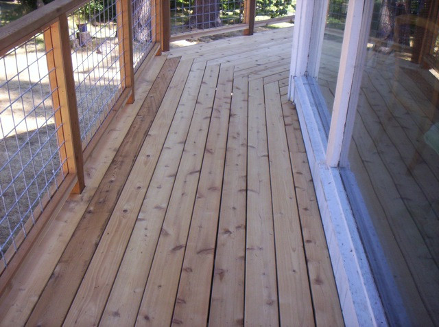 Deck - small backyard balcony deck idea in Seattle with no cover