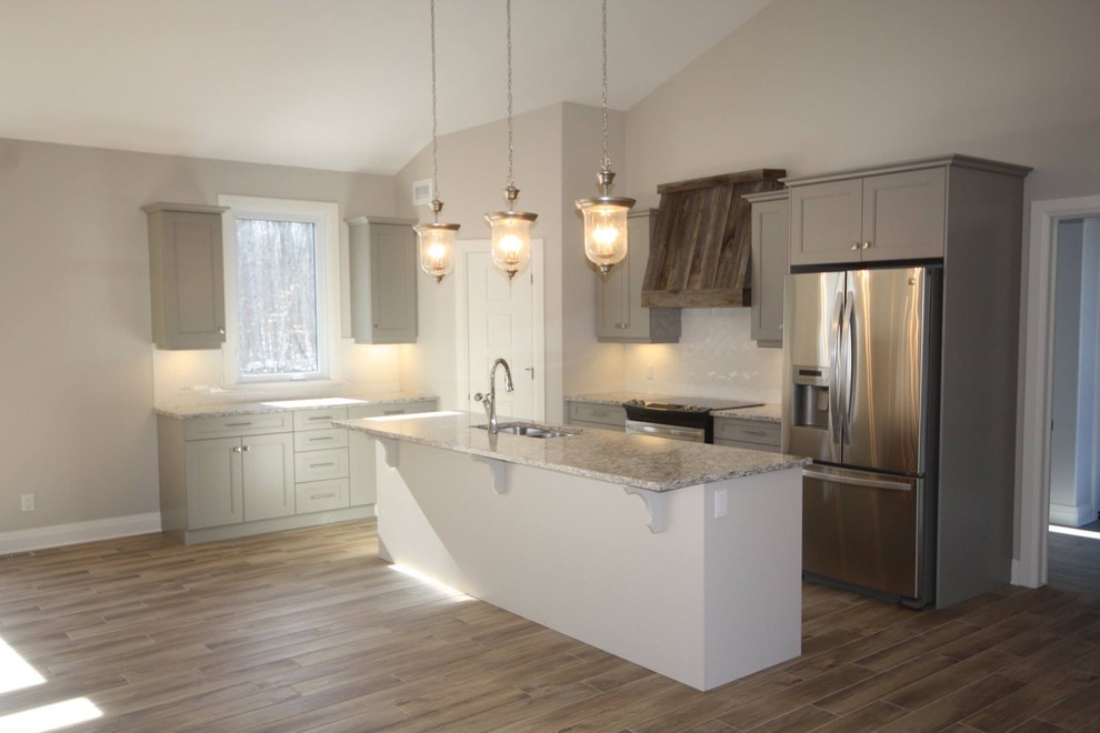 Example of a transitional kitchen design in Ottawa