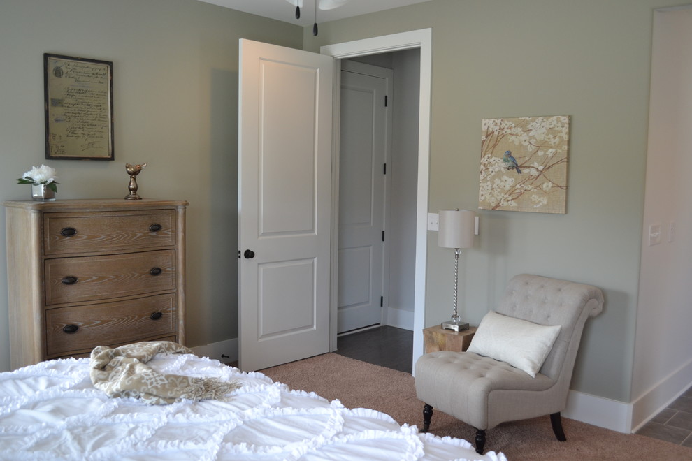 Bedroom - mid-sized transitional guest carpeted bedroom idea in Birmingham with beige walls