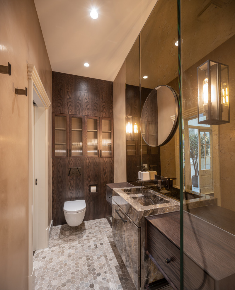 This is an example of a small traditional master bathroom in London with recessed-panel cabinets, brown cabinets, an open shower, a wall-mount toilet, brown tile, marble, beige walls, mosaic tile floors, a wall-mount sink, marble benchtops, purple floor, an open shower, brown benchtops, a single vanity and a floating vanity.