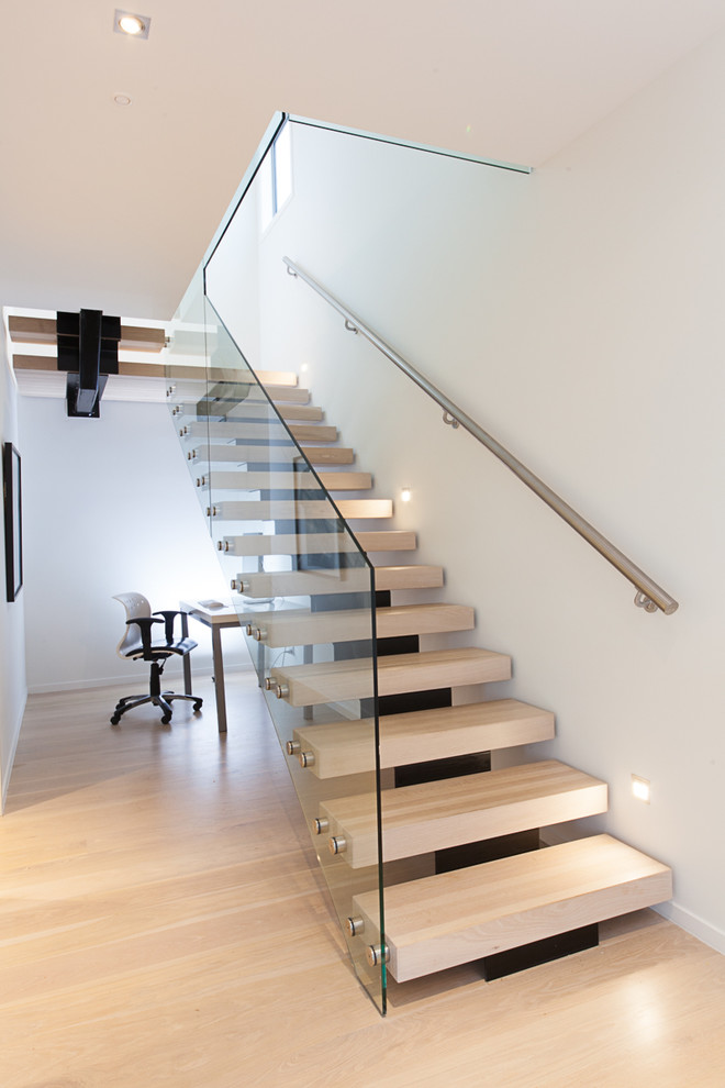 Mid-sized modern wood floating staircase in Auckland with open risers.