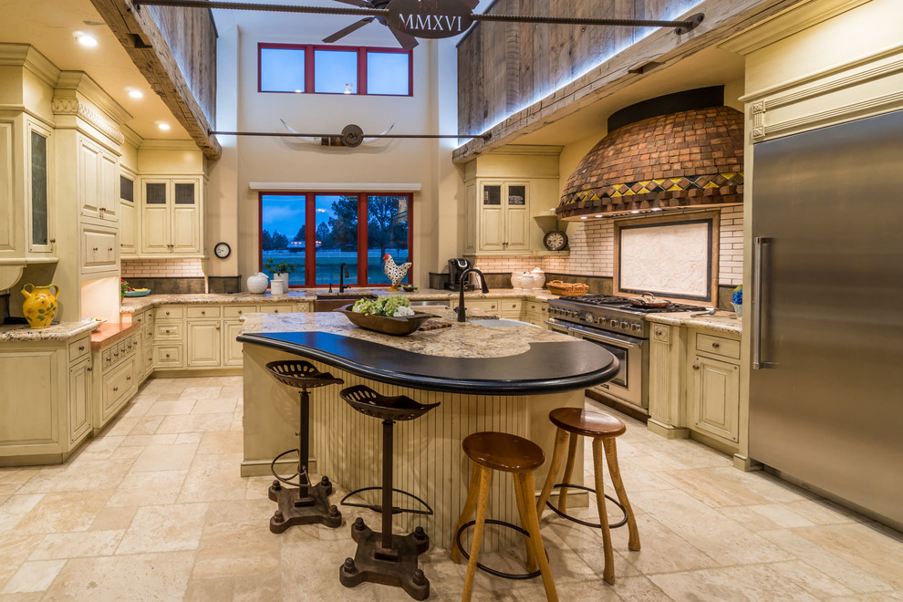 Inspiration for a country l-shaped beige floor kitchen remodel in Other with raised-panel cabinets, white cabinets, white backsplash, subway tile backsplash, stainless steel appliances and an island