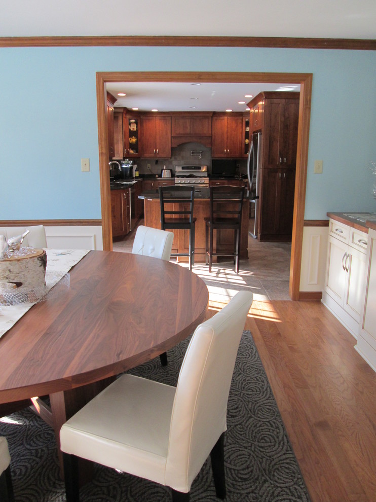 Inspiration for a mid-sized transitional light wood floor kitchen/dining room combo remodel with blue walls and no fireplace