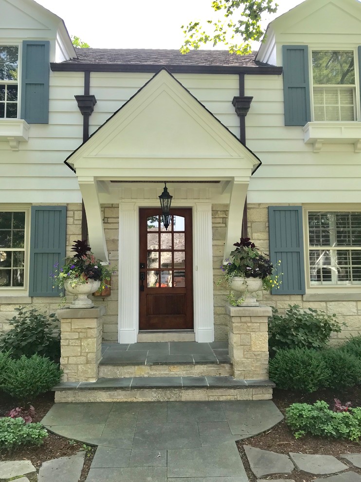Mid-sized transitional slate floor and blue floor front door photo in Chicago with white walls and a medium wood front door