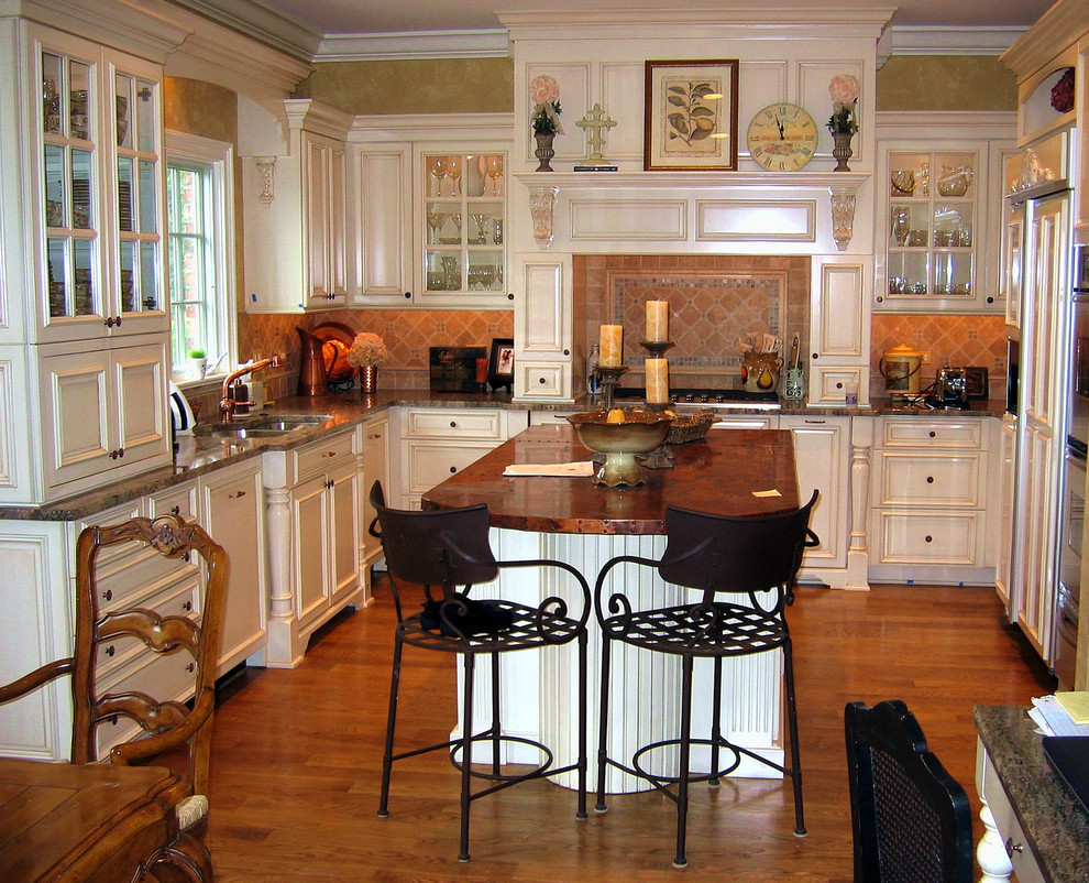 Design ideas for a traditional kitchen in Chicago with copper benchtops.