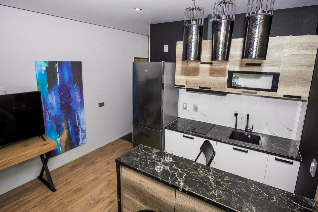 Гостиная 1-х комнатной студии квартиры в Сочи ул.Фабрициуса