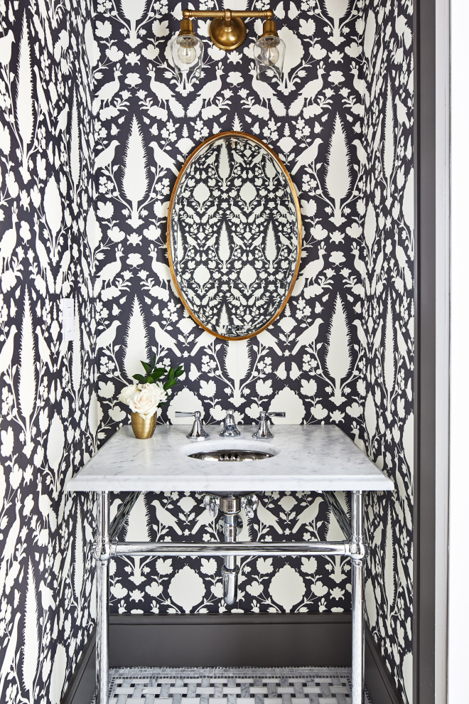 Small transitional mosaic tile floor and gray floor powder room photo in Los Angeles with multicolored walls and a console sink
