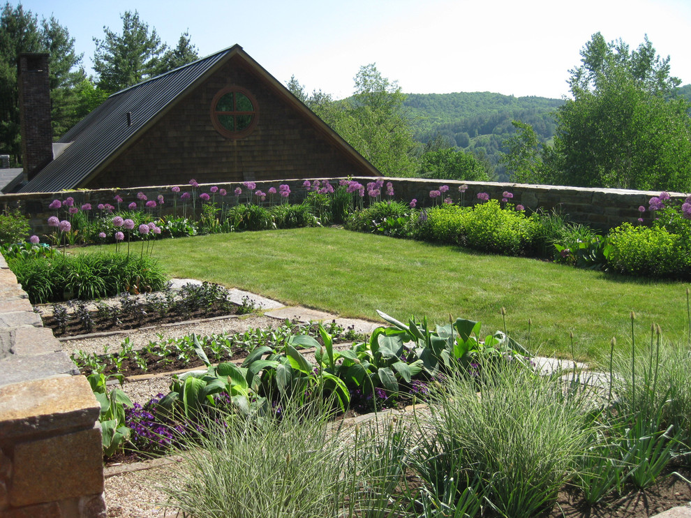 Inspiration for a traditional garden in Burlington with a vegetable garden.