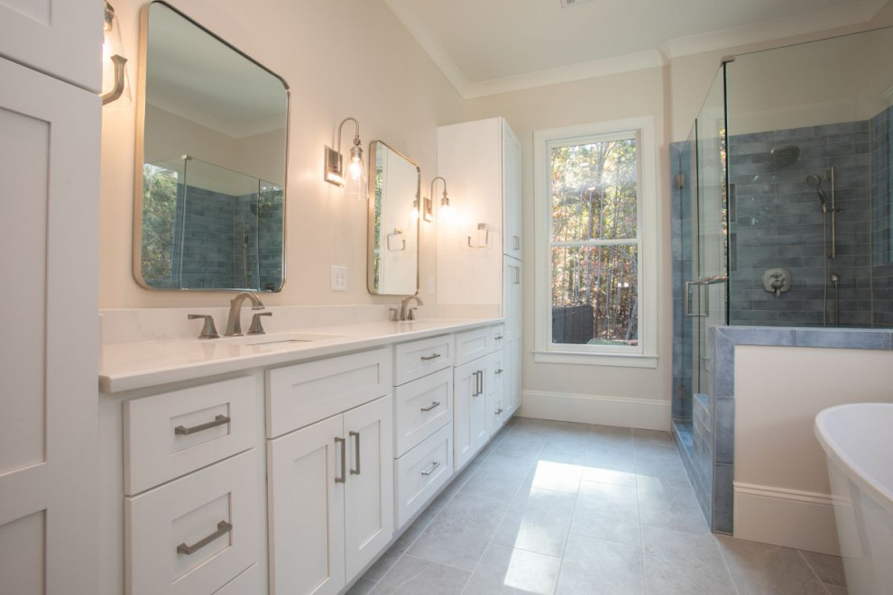 Inspiration for a transitional bathroom in Atlanta with a double vanity.