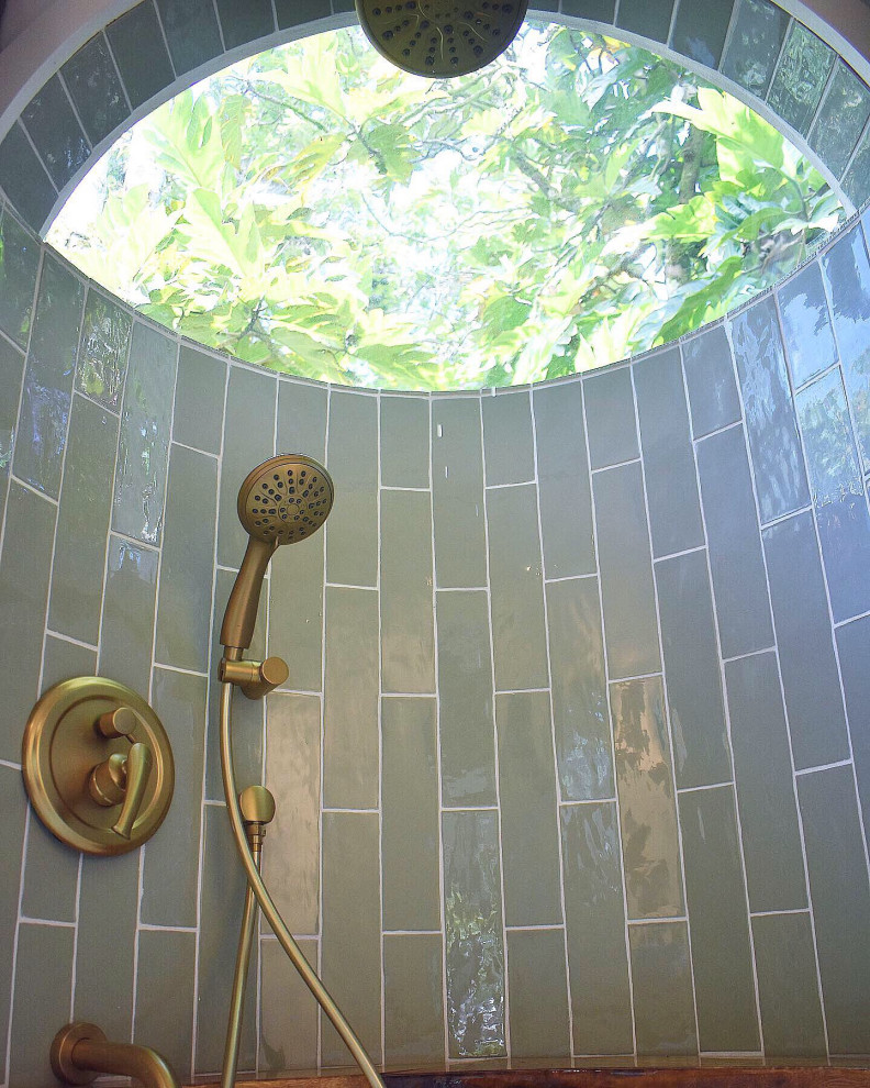 Design ideas for a small beach style ensuite bathroom in Hawaii with open cabinets, medium wood cabinets, a japanese bath, an alcove shower, a one-piece toilet, green tiles, cement tiles, white walls, vinyl flooring, a vessel sink, wooden worktops, grey floors, an open shower, beige worktops, a shower bench, a single sink, a floating vanity unit, exposed beams and tongue and groove walls.