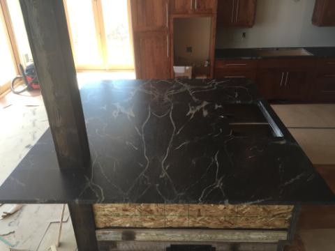 Kitchen - kitchen idea with granite countertops and an island