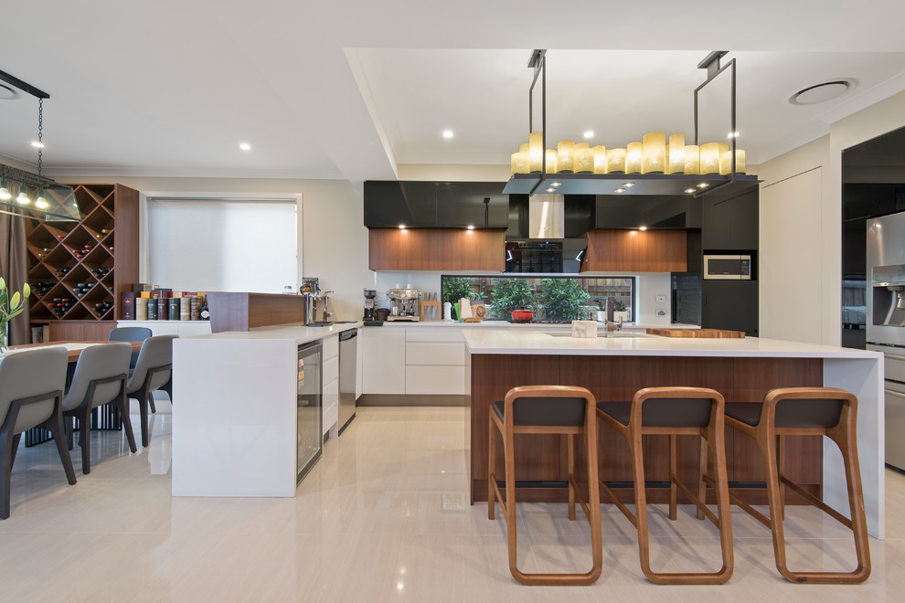 Design ideas for a mid-sized contemporary l-shaped eat-in kitchen in Brisbane with an undermount sink, flat-panel cabinets, medium wood cabinets, quartz benchtops, brown splashback, glass sheet splashback, stainless steel appliances, porcelain floors and with island.