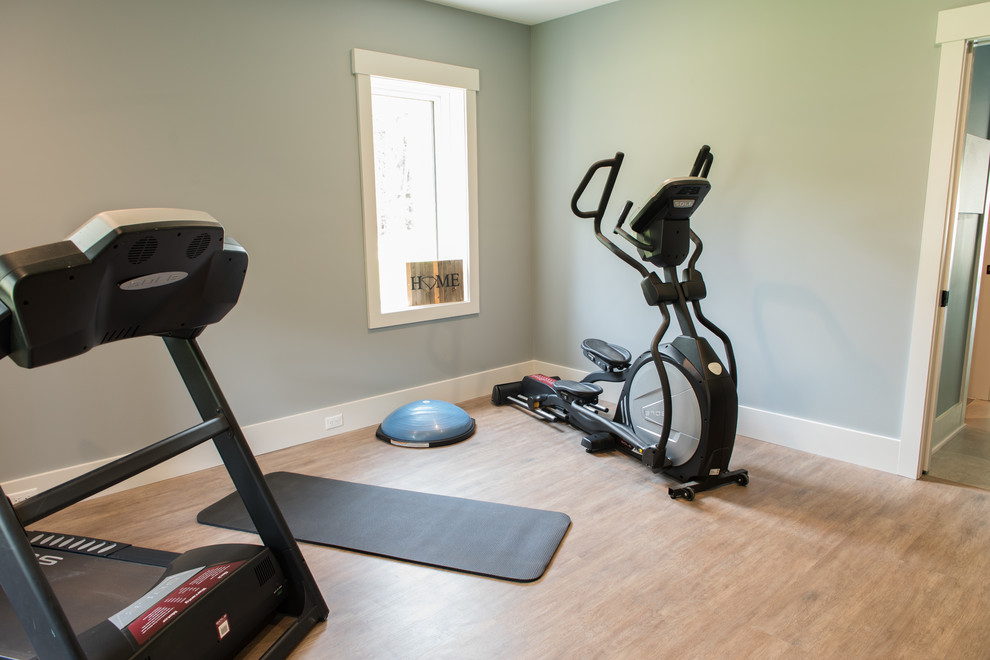 Inspiration for a mid-sized transitional home gym in Charleston with grey walls, vinyl floors and brown floor.