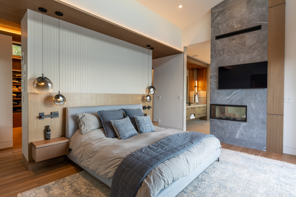 Example of a minimalist bedroom design in Vancouver