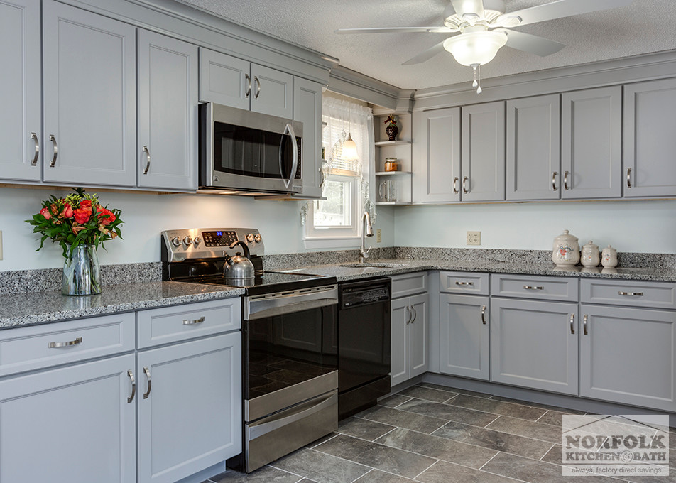 Home design - mid-sized transitional u-shaped home design idea in Boston with an undermount sink, shaker cabinets, gray cabinets, granite countertops, stainless steel appliances and no island