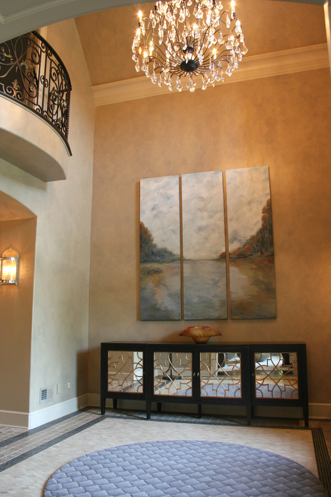 Mid-sized transitional entry hall photo in Columbus with beige walls