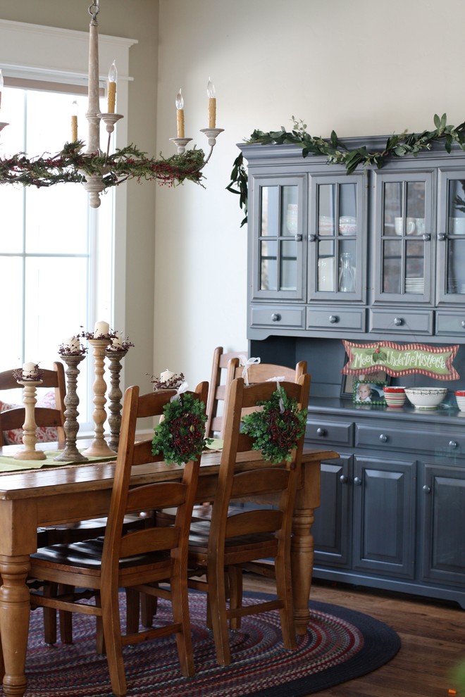 Elegant dark wood floor dining room photo in Salt Lake City with white walls