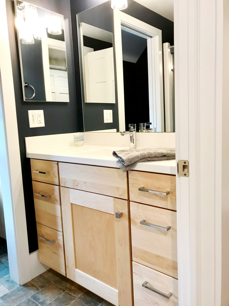 Inspiration for a small transitional 3/4 bathroom in Detroit with shaker cabinets, blue walls and a single vanity.