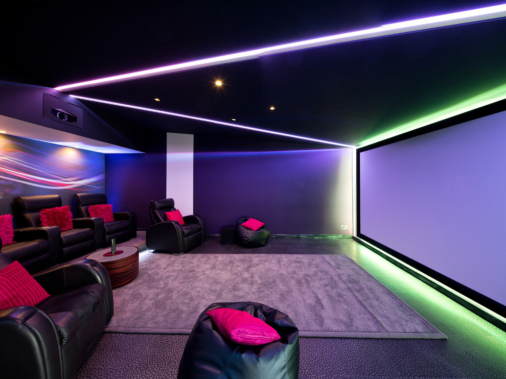 Mid-sized contemporary home theatre in Other with a projector screen.