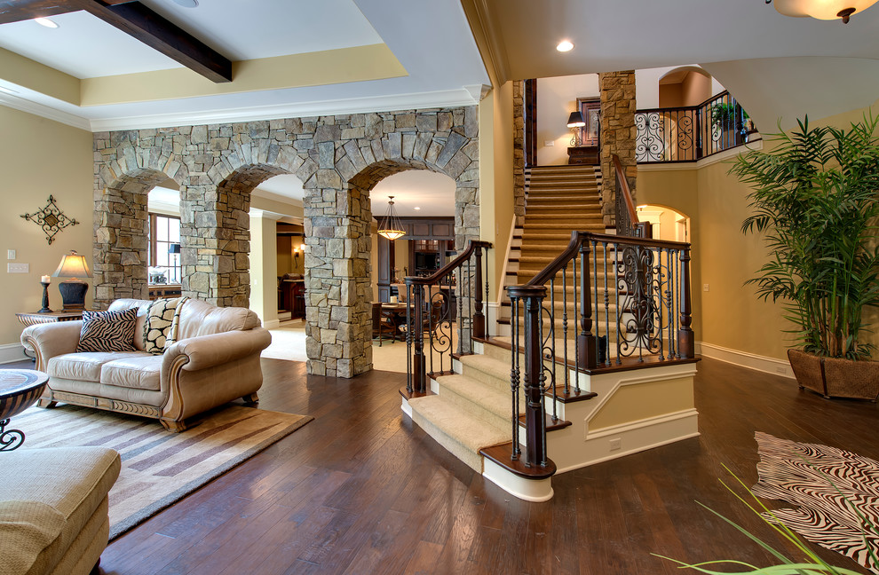 Design ideas for a large arts and crafts wood l-shaped staircase in Indianapolis with painted wood risers.