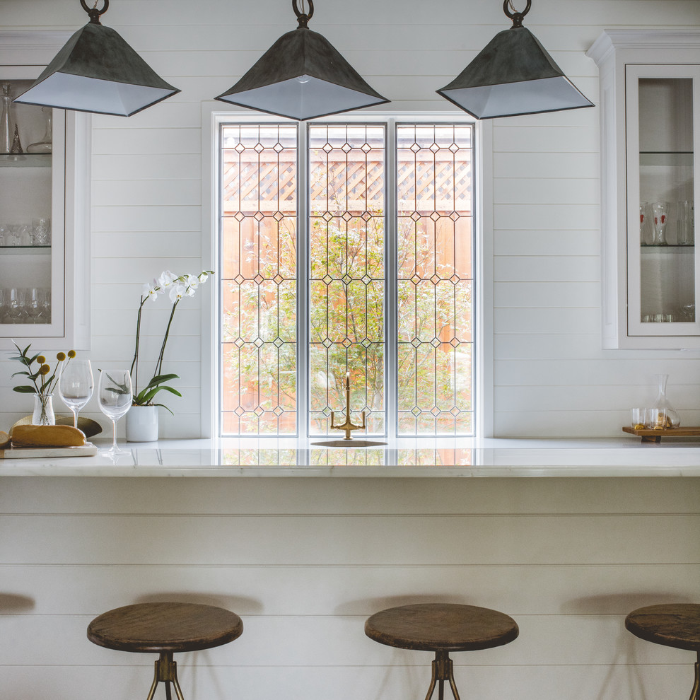Example of a transitional kitchen design in Dallas
