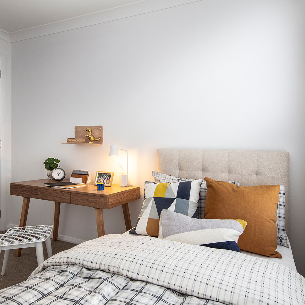 Inspiration for a large midcentury guest bedroom in Canberra - Queanbeyan with white walls, carpet and brown floor.